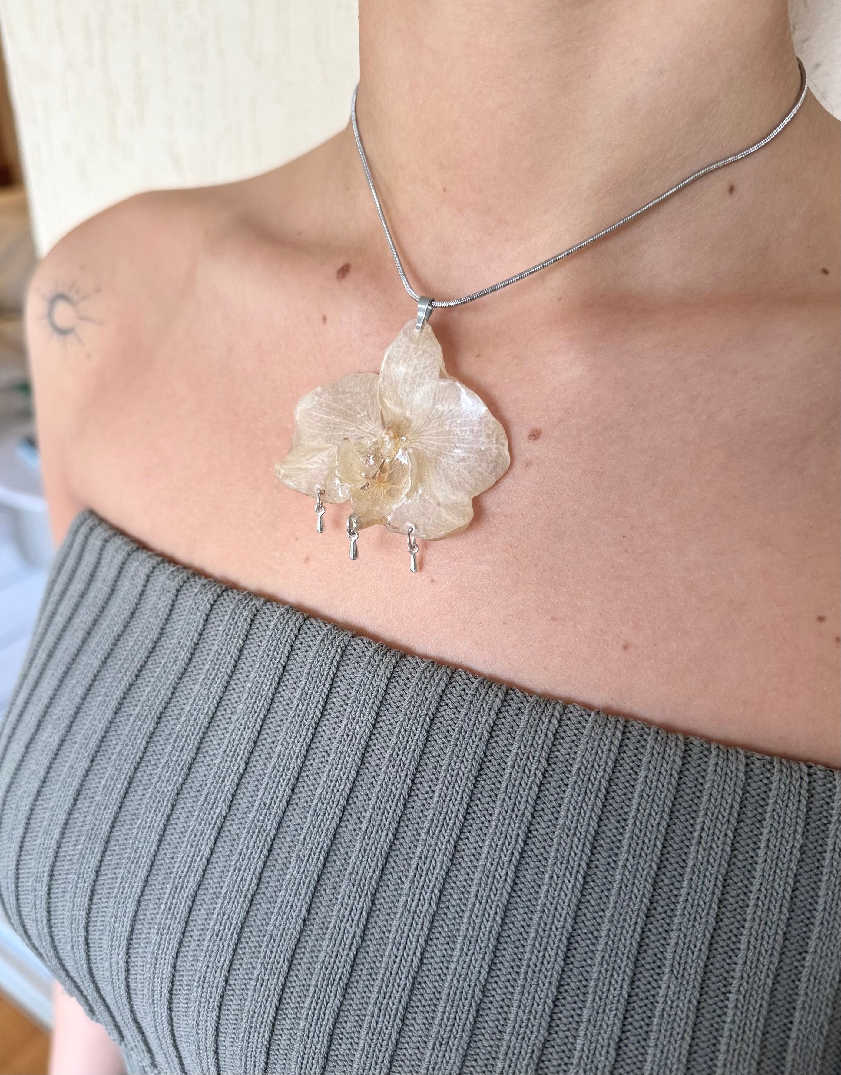 Snow Orchid Necklaces